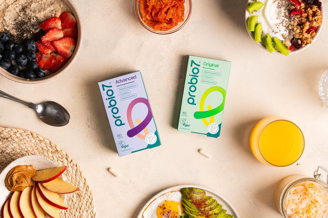 Probio7 probiotics on table with nutritious and colourful foods 